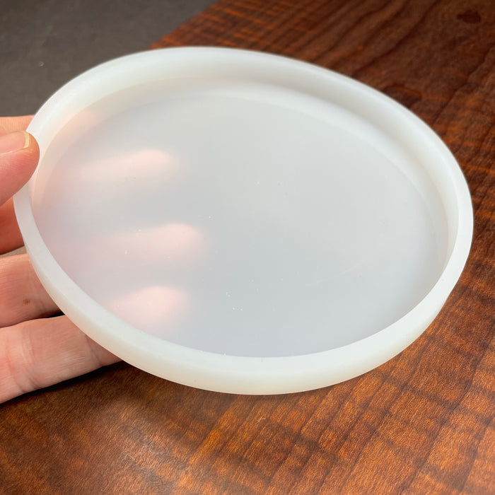 larger size circle that is perfect for small projects and leftover resin if you are making a bigger project and miscalculated what you need it can be poured into this form so that there is no waste in your shop