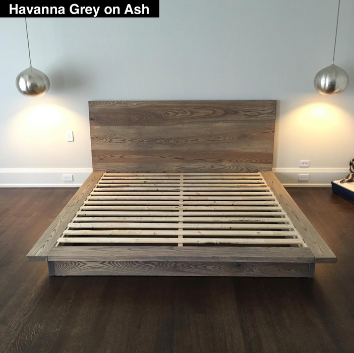 bed frame in a big room made from ash with a grey havanna oil finish for protection