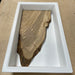 Olive wood slab positioned inside 10 x 18 HDPE epoxy mold for charcuterie board or resin project