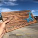 Custom, Jeff Mack Designs epoxy and wood sign featuring Possum Kingdom Lake in Gradford, Texas.