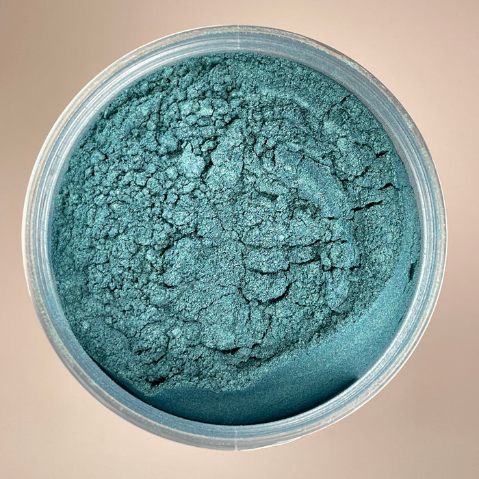 a colour shift pigment powder that once cured in resin will go between the colours of blue and green