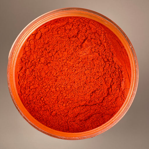 bright orange that you would expect to see on coral under the sea . vibrant and bright it is perfect to include into any diy project that requires a pigment base