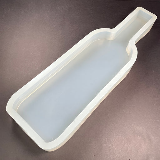 silicone mold in the shape of a wine bottle that can have wood and resin placed inside to give you a unique design and pattern to display a food spread on it and serve with wine if desired 