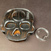 skull bottle opener that is great for any gothic theme or halloween party. Piece of wood looks burnt but is actually tiger wood that has naturally dark stripping 