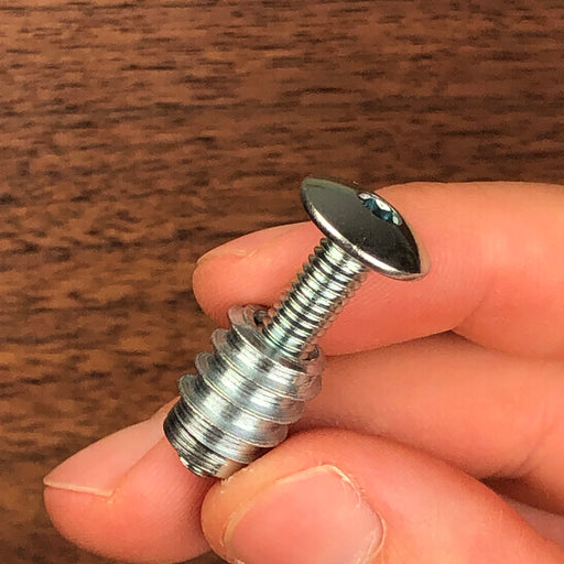 mushroom screw threaded into an insert